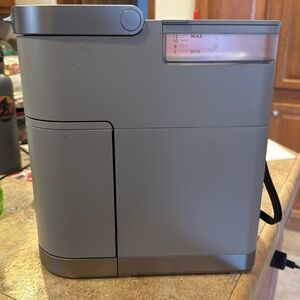 Mini 1 cup Keurig. Used maybe twice! Smoke free home! All Grey.